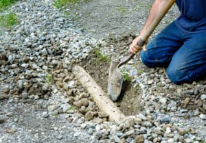 french drain installation to prevent basement flooding
