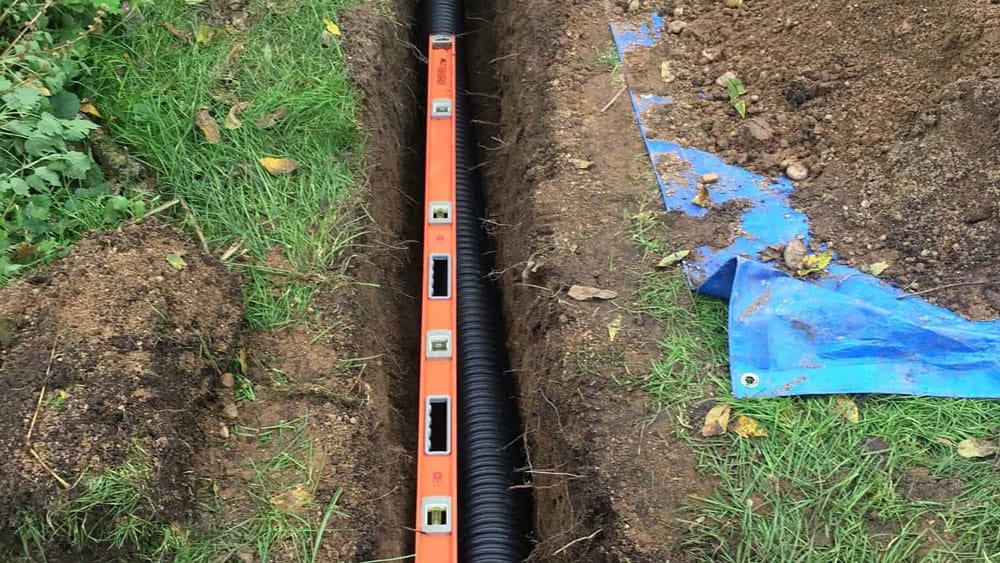 french drain installation example for backyard