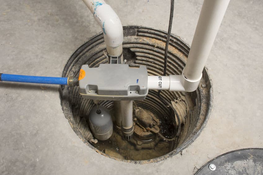 Sump Pump installation for drainage and flooding protection